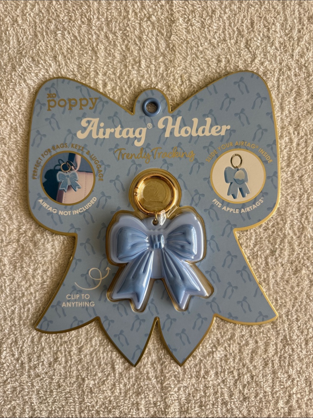 XO Poppy Bow Airtag Holder in Light Blue Keychain